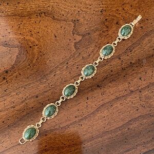 Elegant Gold and Green Bracelet